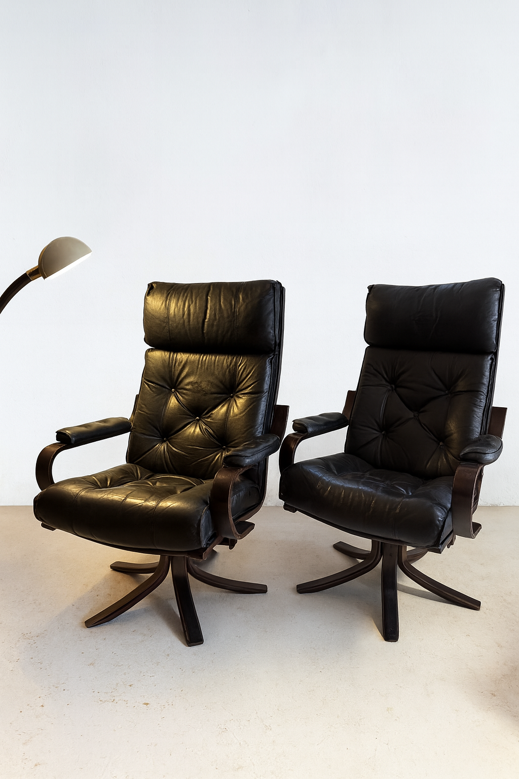 Danish Rosewood & Leather Swivel Lounge Chairs by P. Schultz & Co. — 1960s
