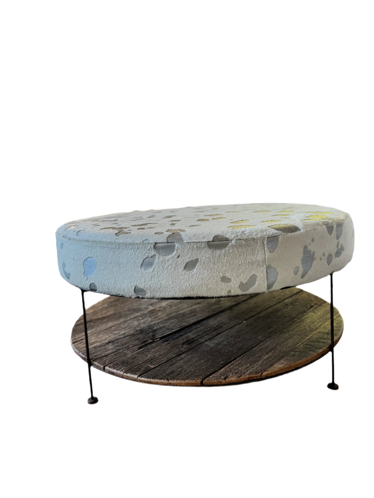 Bespoke metallic cowhide ottoman with magazine rack on recycled timbers