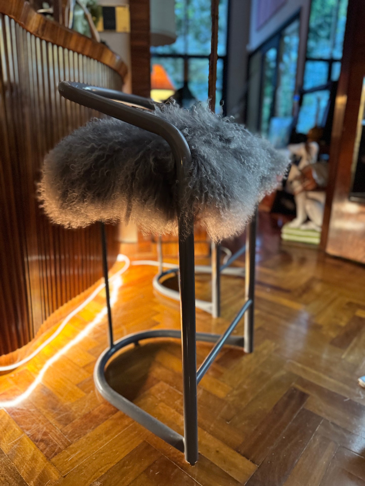 Kitchen counter stools with Mongolian sheepskin upholstered seats