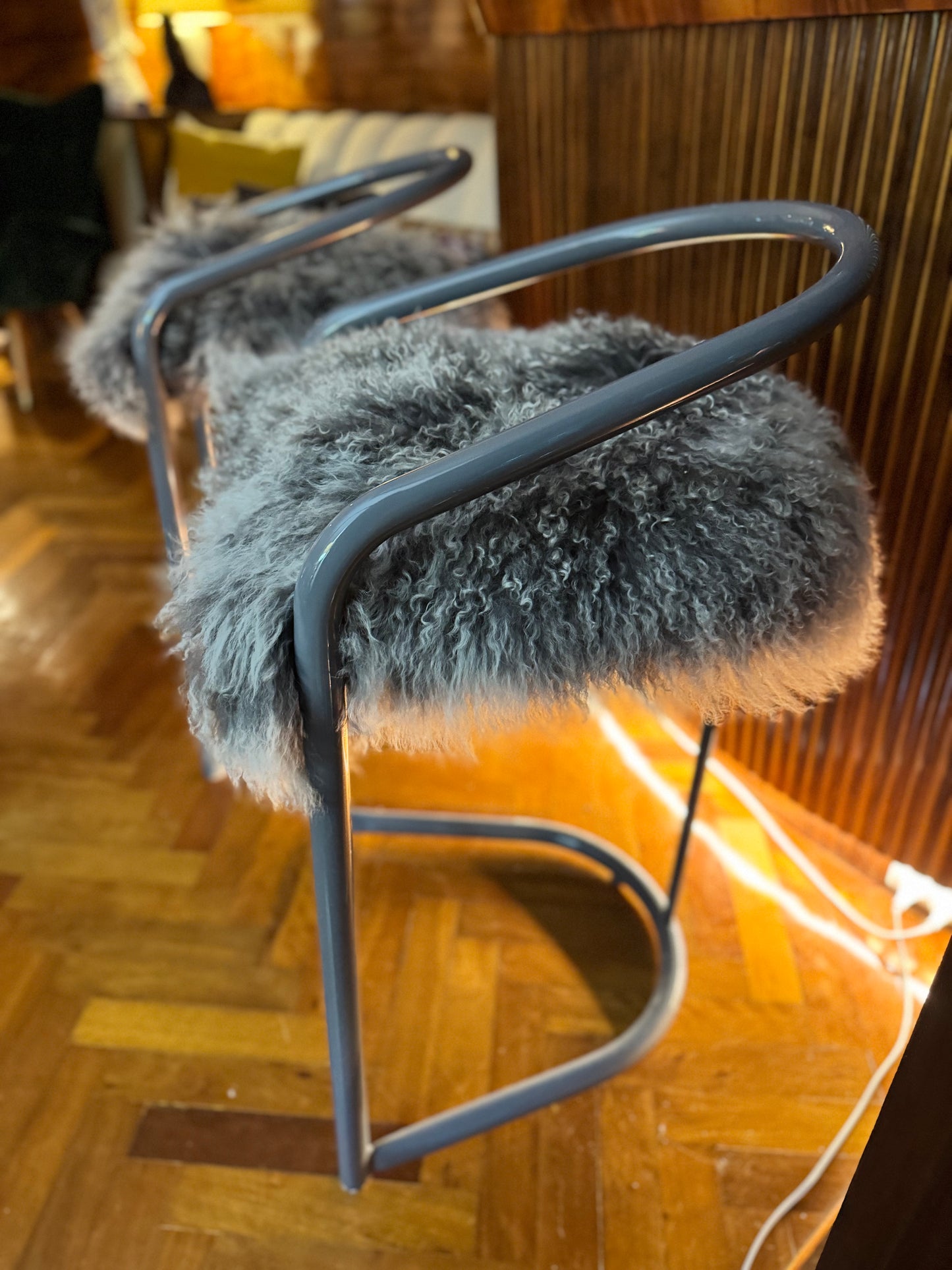 Kitchen counter stools with Mongolian sheepskin upholstered seats