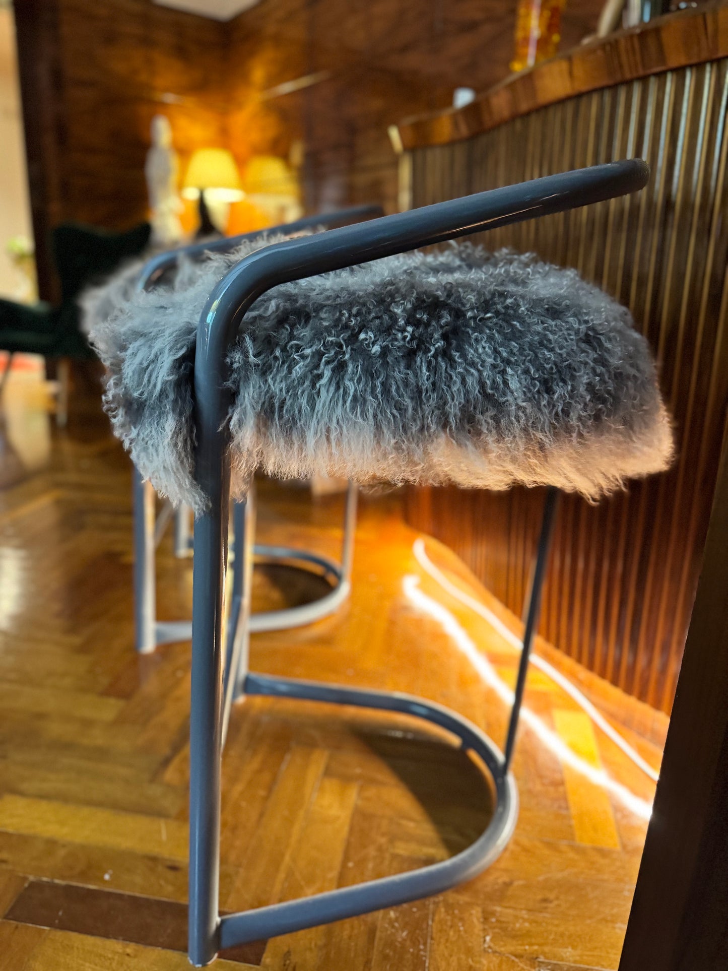 Kitchen counter stools with Mongolian sheepskin upholstered seats