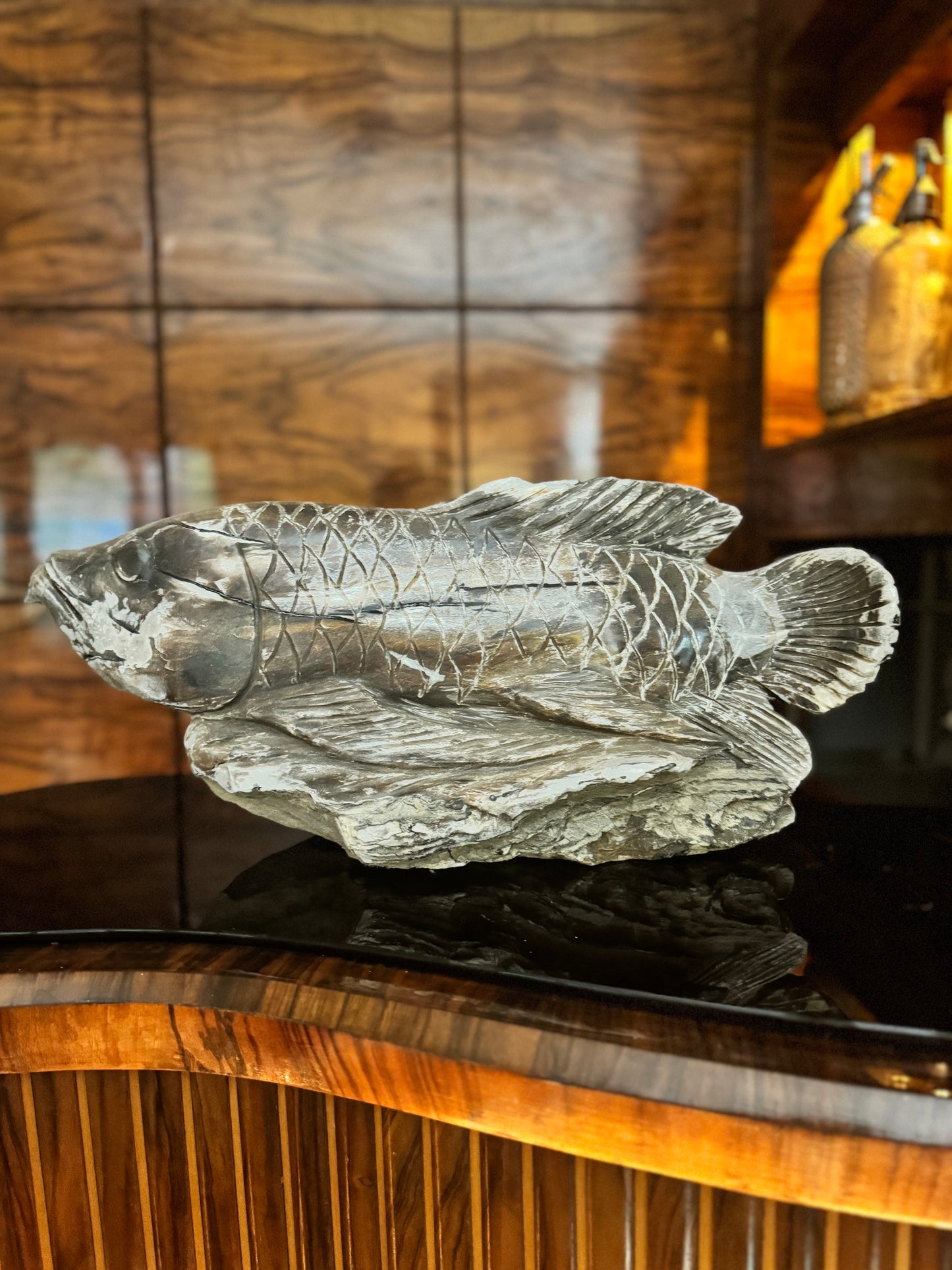 Hand carved petrified wood fish sculpture