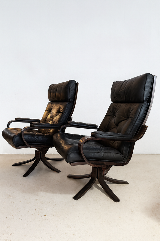 Danish Rosewood & Leather Swivel Lounge Chairs by P. Schultz & Co. — 1960s
