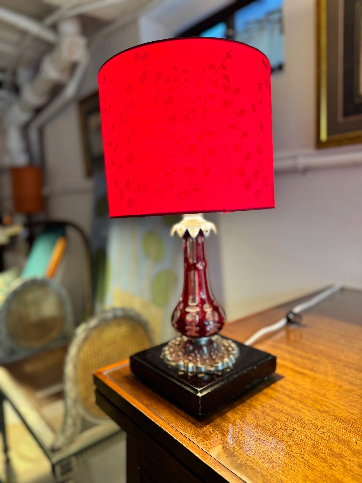 Bohemian ruby cut glass lamp with red shade